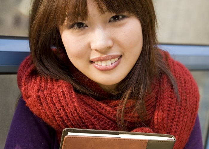 asian woman kindly smiling