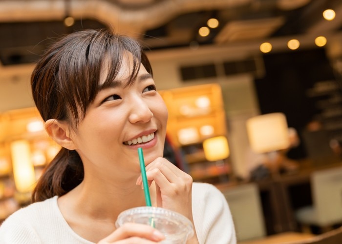 woman has a drink