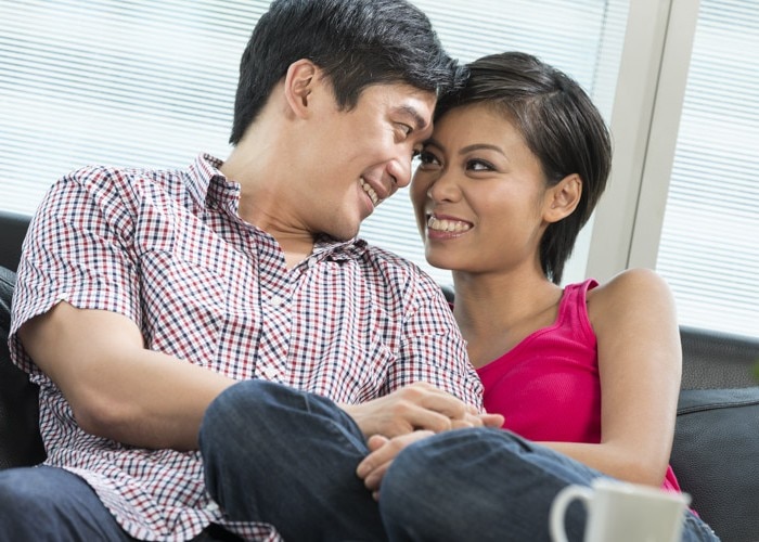 couple sitting on sofa