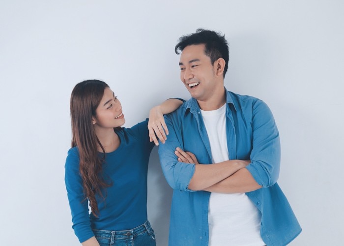 man and woman in blue shirts